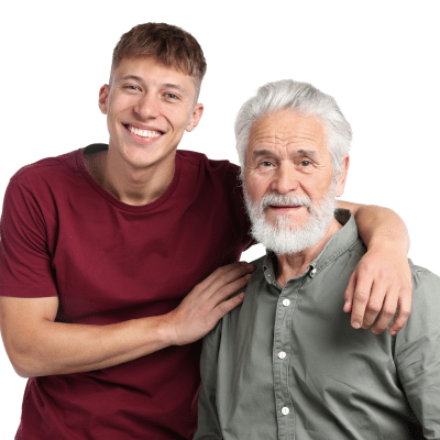 Older man and younger man posing for a photo, representing benefits of regular dental visits